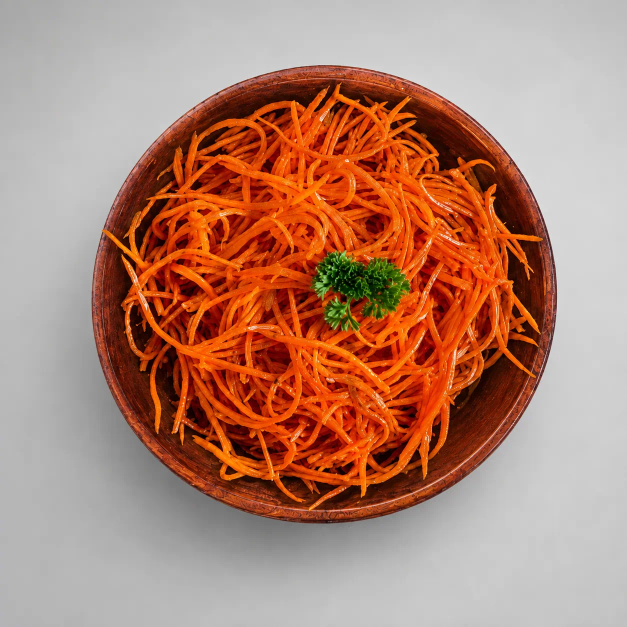 Kebab Grill Korean-style spicy carrot salad in a wooden bowl