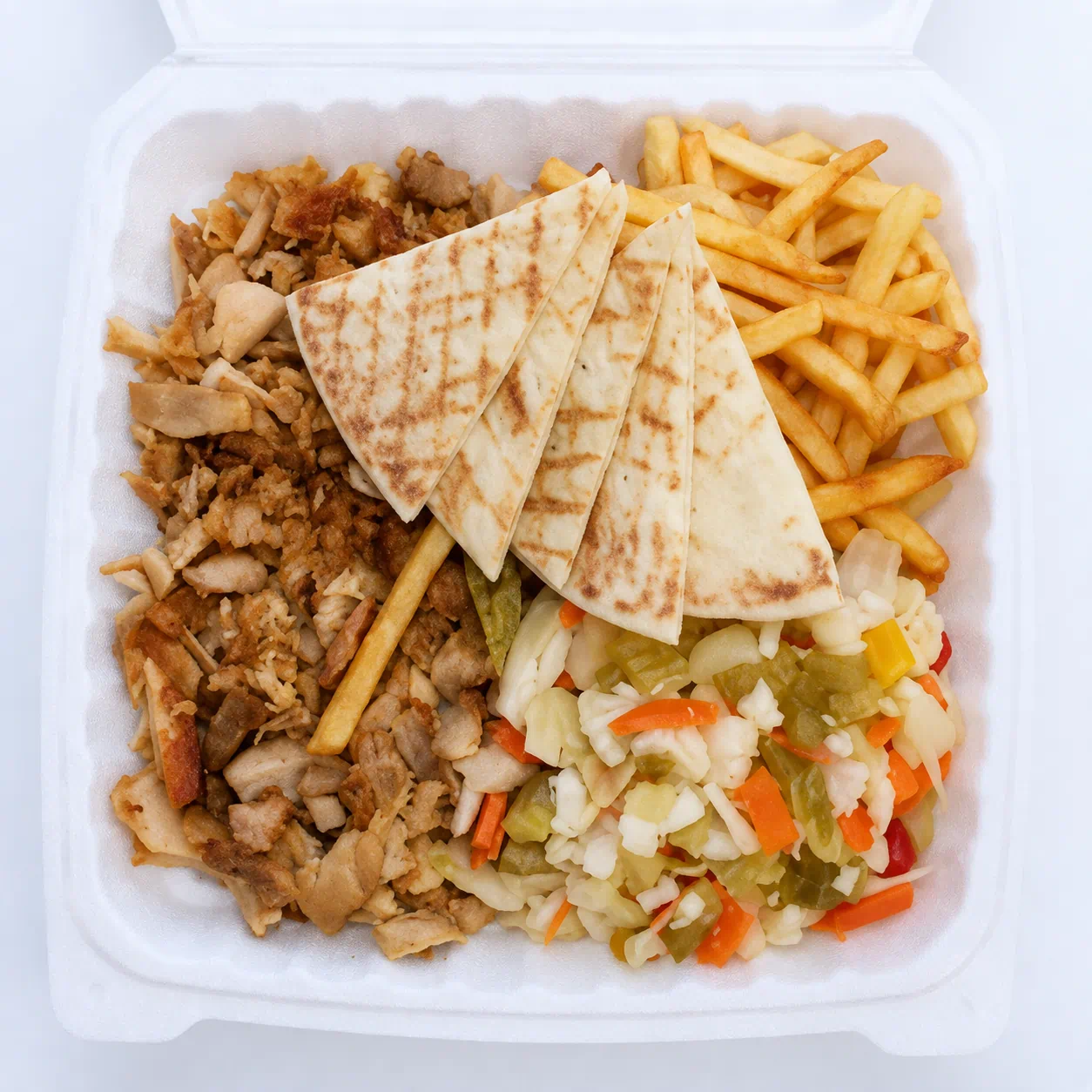 Kebab Grill Gyros Plate with chicken, pita, fries and pickled vegetables